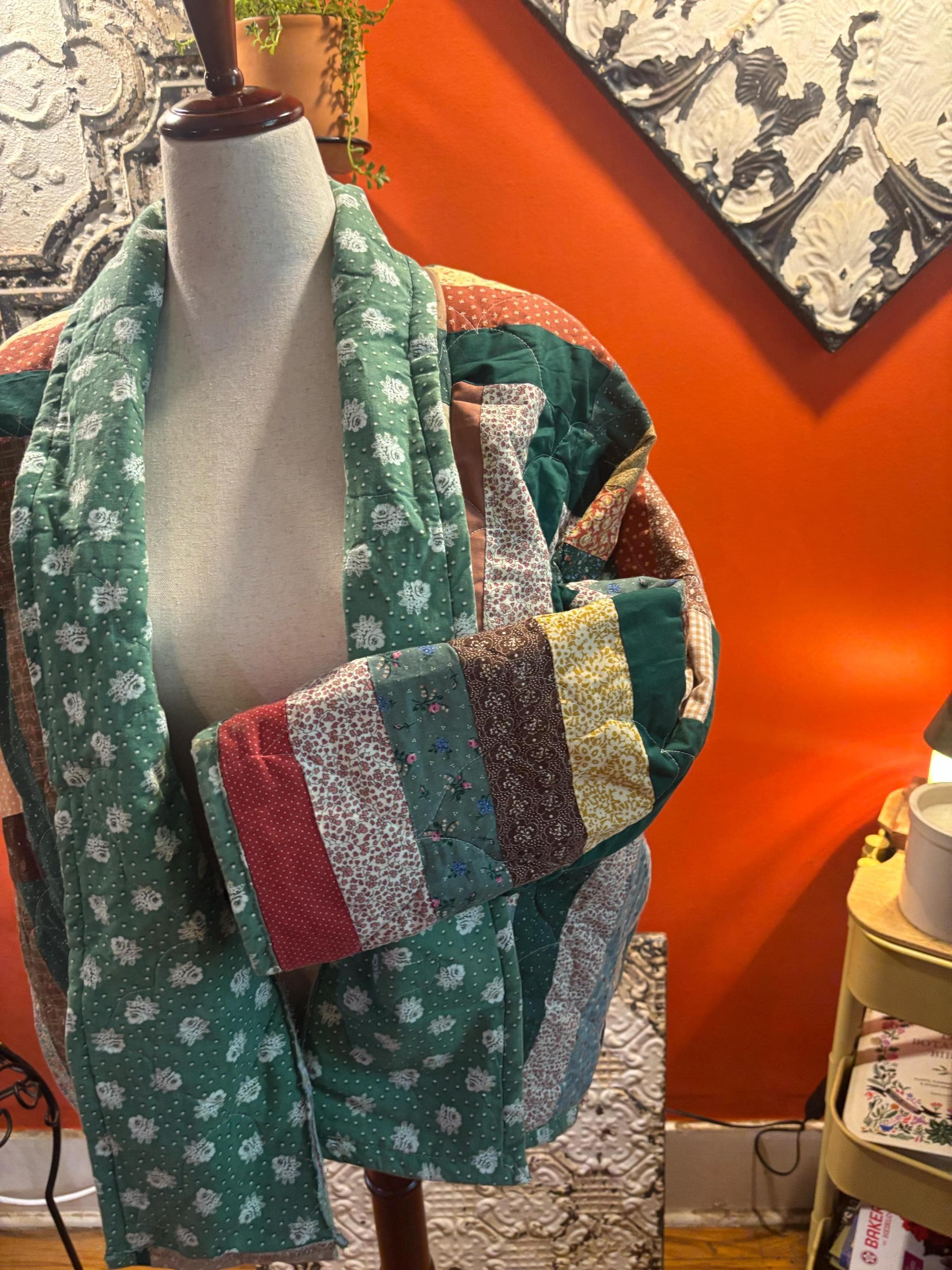 Handmade oversized quilt coat in a size small/medium is greens/reds/browns. (Olive 1)