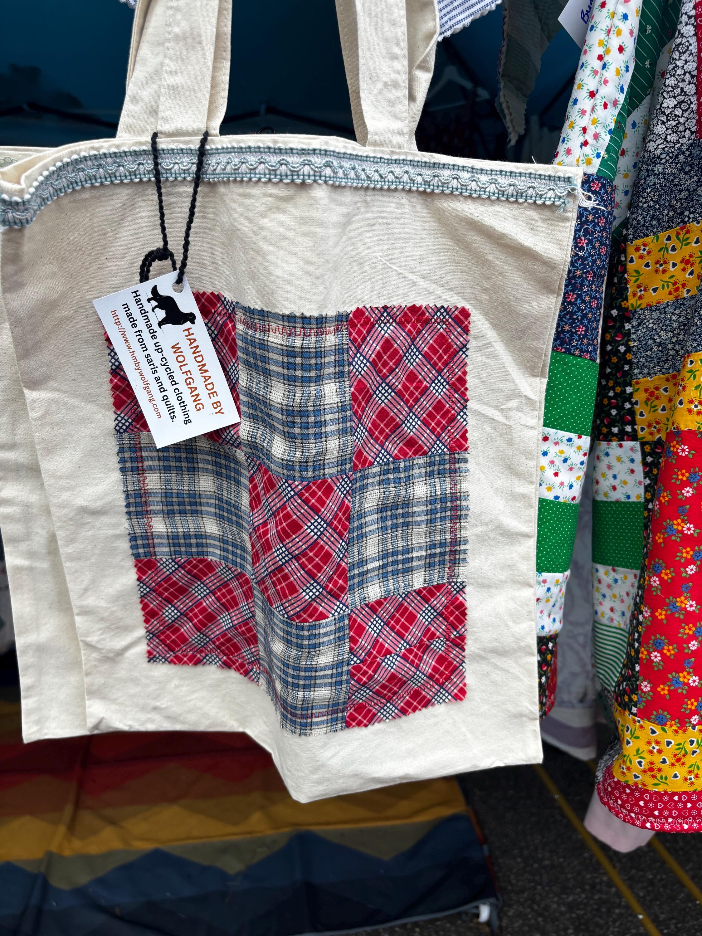 Assorted tote bags made from quilt squares