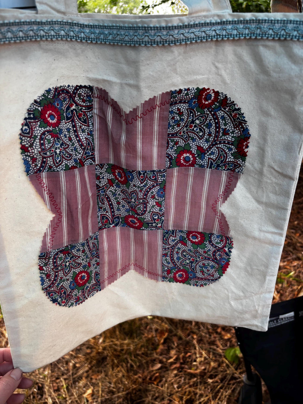 Assorted tote bags made from quilt squares