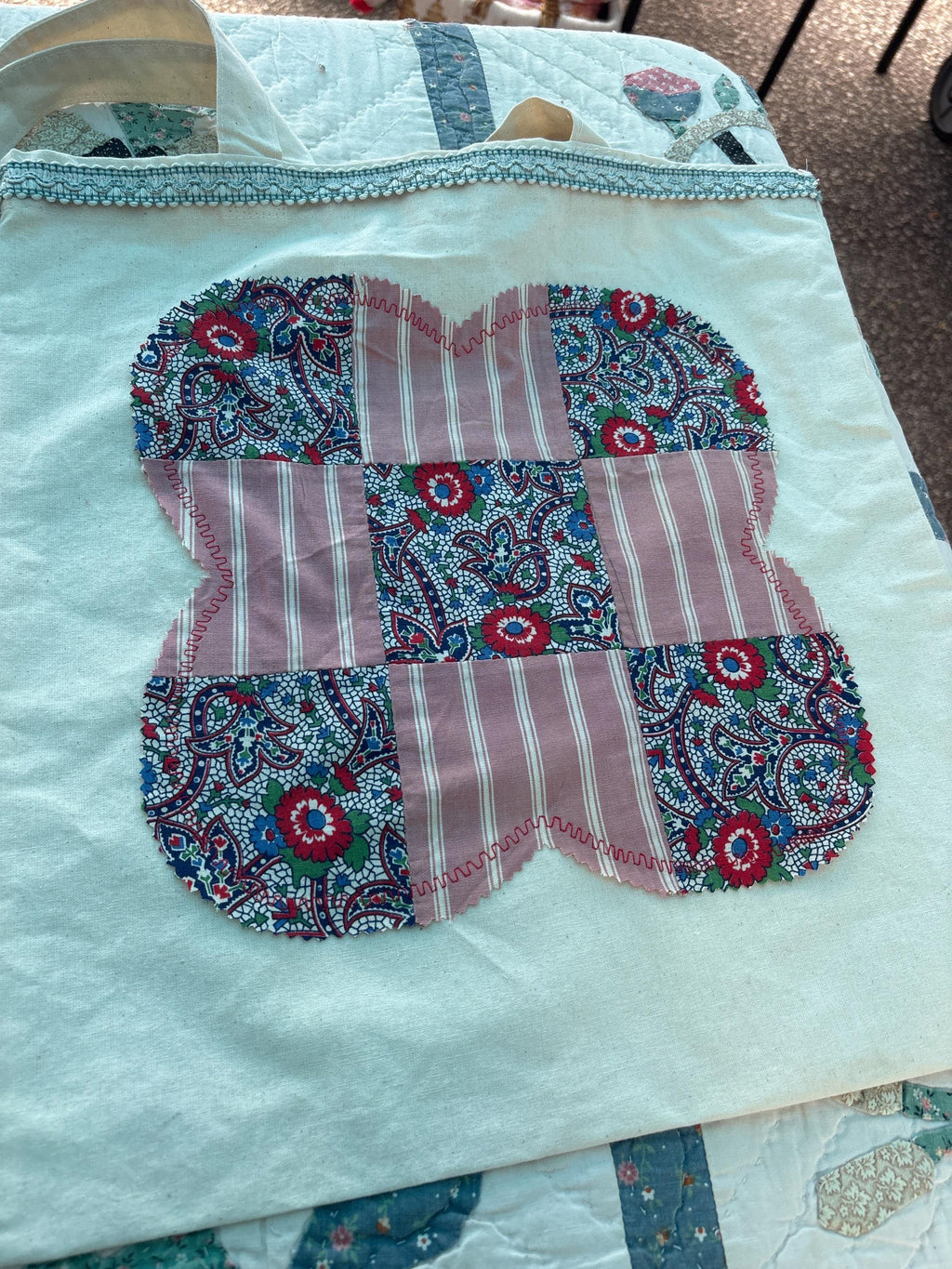 Assorted tote bags made from quilt squares